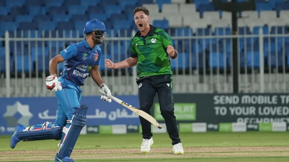 ** Cricket players on green field during international match between Ireland and Afghanistan teams