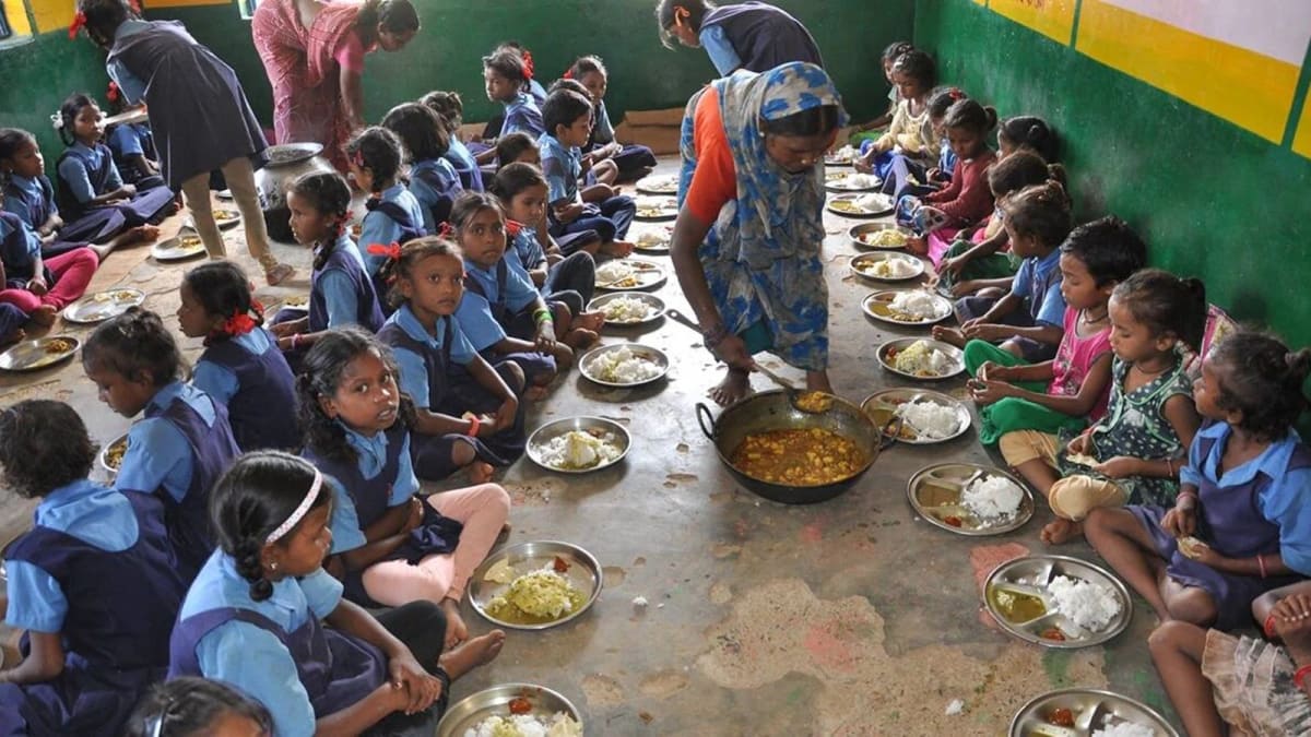 Health officials inspecting food preparation area in Gujarat school cafeteria for safety compliance