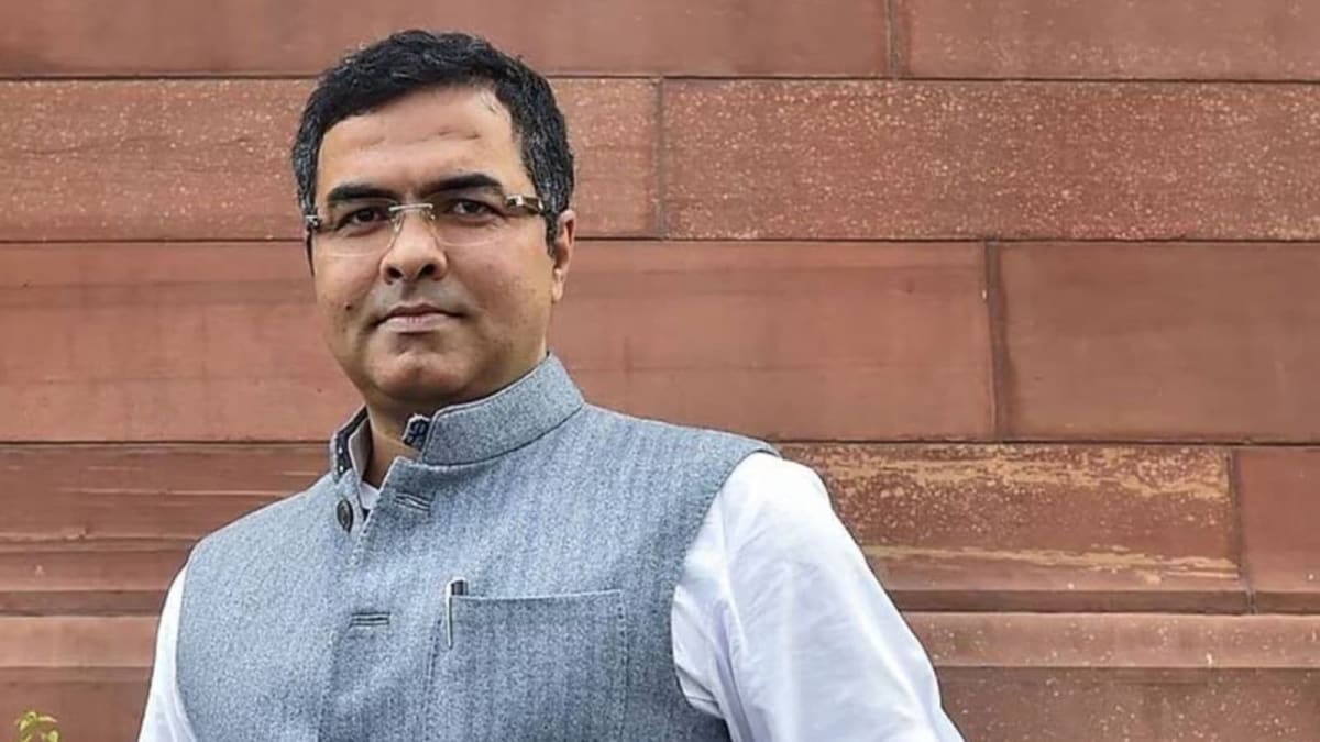 ** Delhi government office worker using computer for online tender submission system