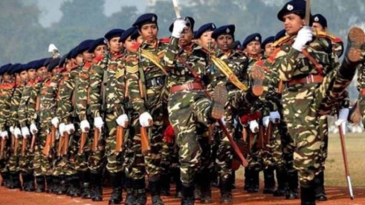 Female students in military training uniforms practicing drills at Maharashtra's pre-military institute