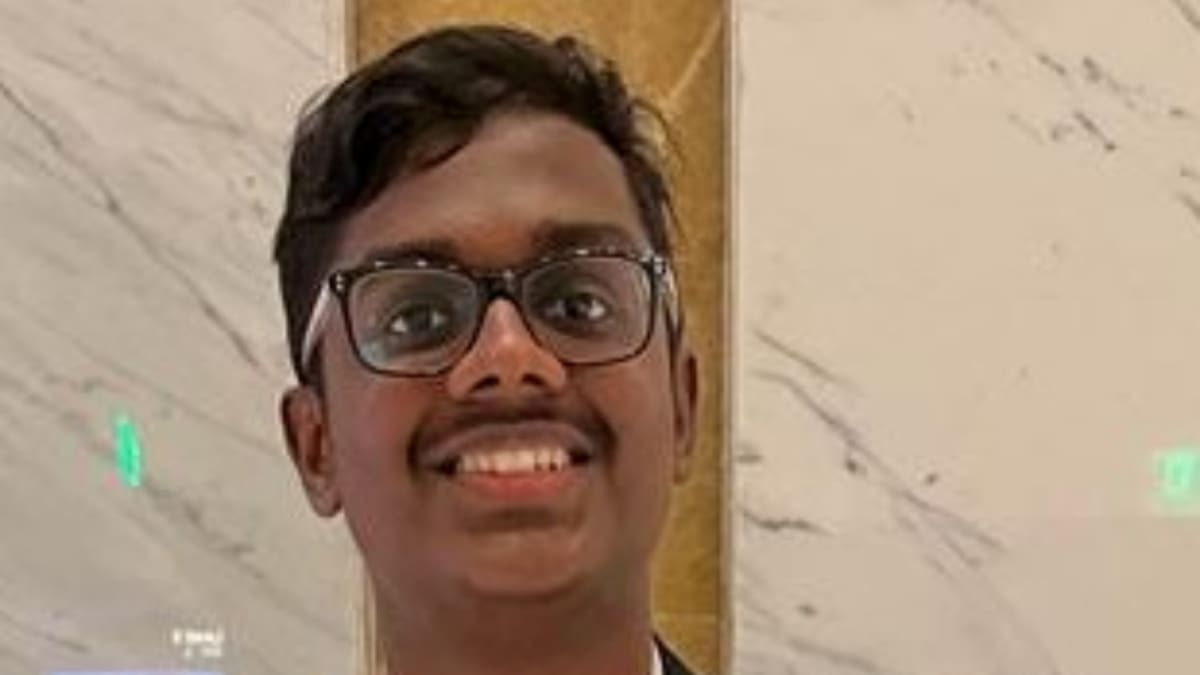 Young Indian student Sohan Manjarekar smiling after achieving third rank on national Chartered Accountant exam