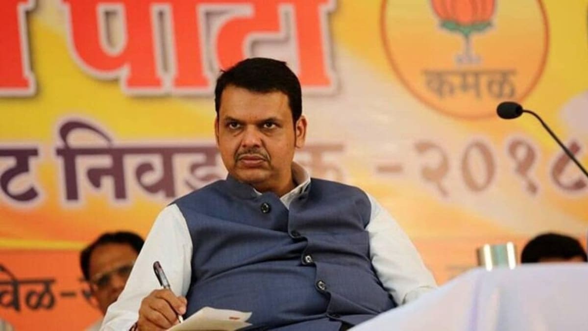 ** Maharashtra farmers working in agricultural fields where millions will receive debt relief
