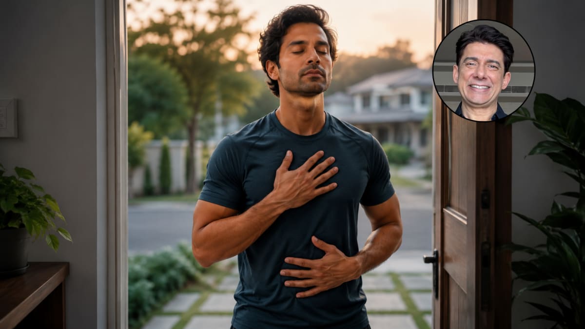 Person pausing peacefully at front door practicing deep breathing after work day
