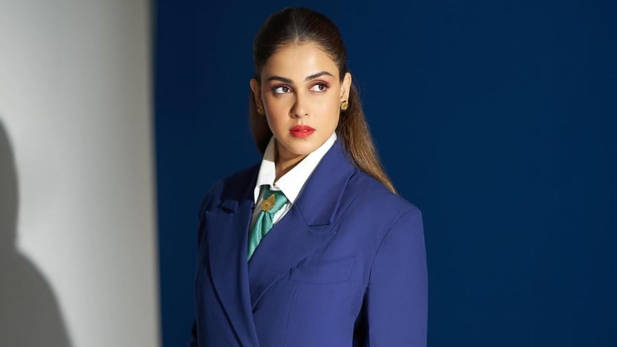Bollywood actress Genelia D'Souza smiling confidently, promoting open conversation about menopause