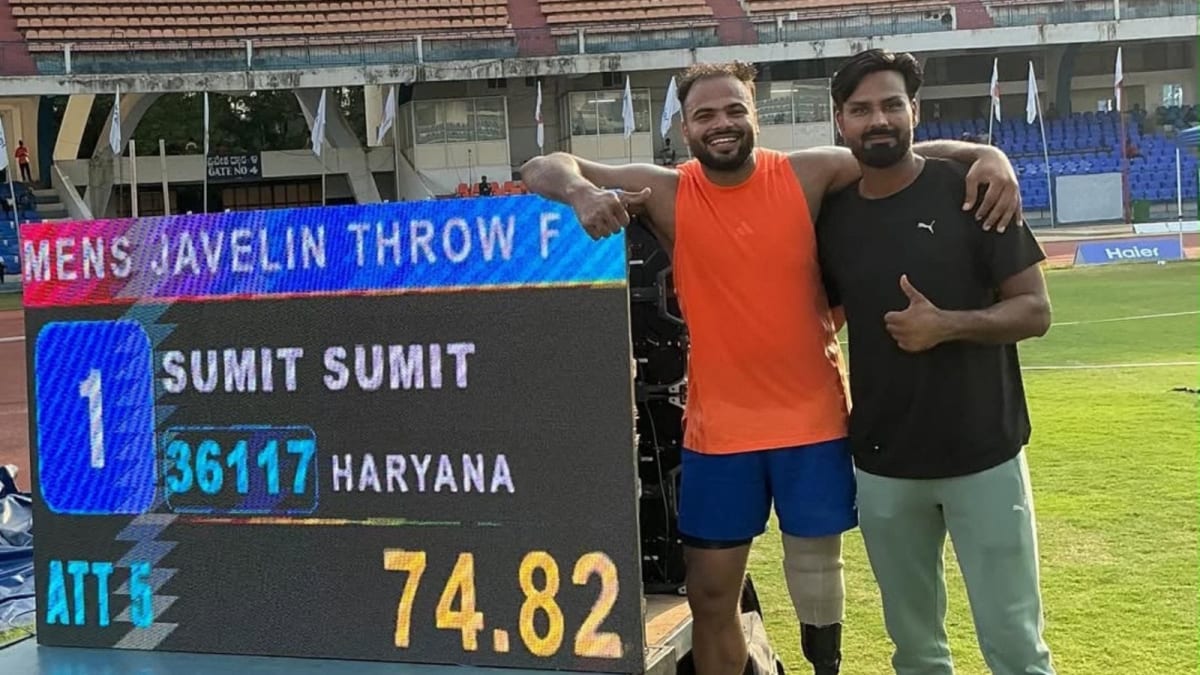 Para javelin thrower Sumit Antil celebrating with coach Vipin Kasana after world record throw