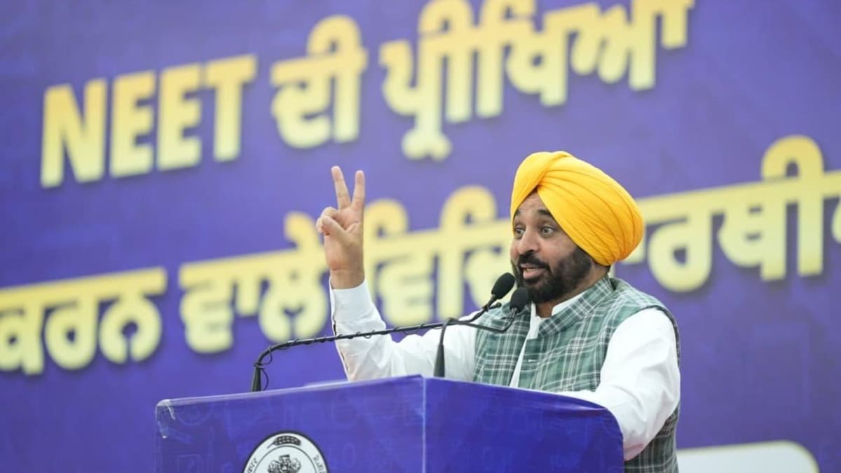 ** Students celebrating NEET qualification results at ceremony in Punjab, India