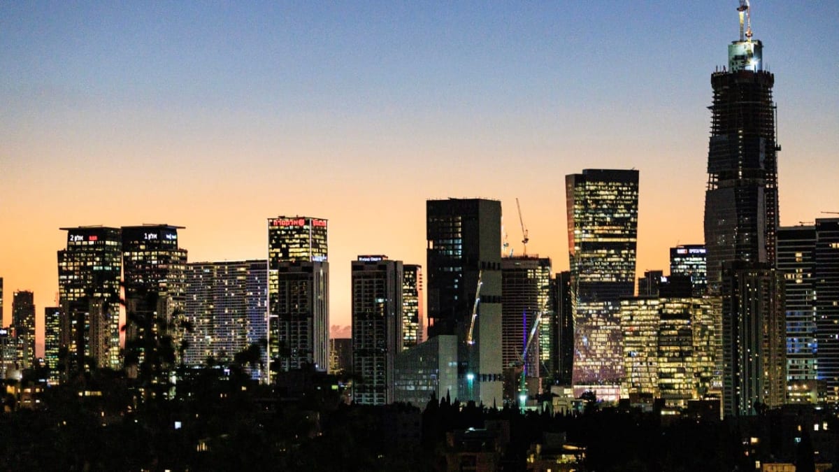 Evening skyline view of Tel Aviv's modern high-rise buildings and technology district