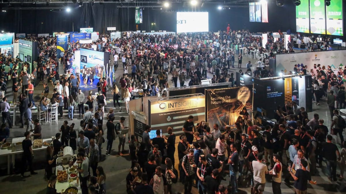 Professionals networking at Unit 8200 Alumni Association conference in Tel Aviv, Israel