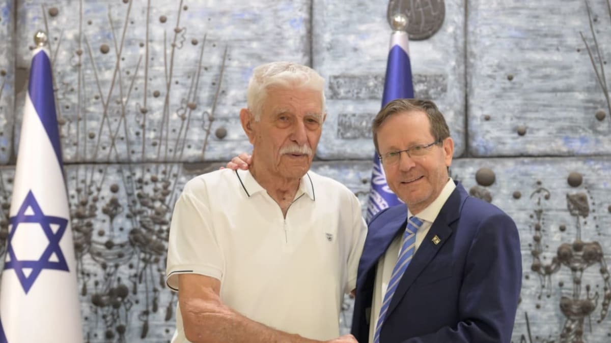Elderly Holocaust survivor David Danieli meeting with Israeli President Isaac Herzog at official residence