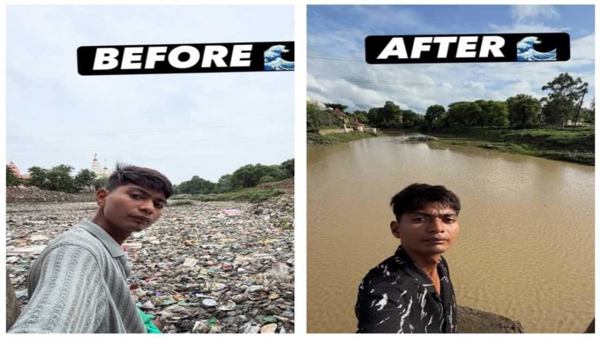 ** Young man cleaning polluted river filled with plastic waste and debris in India