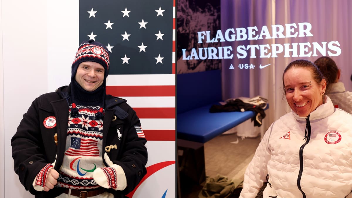 Josh Pauls and Laurie Stephens holding American flag as Team USA Paralympic flagbearers