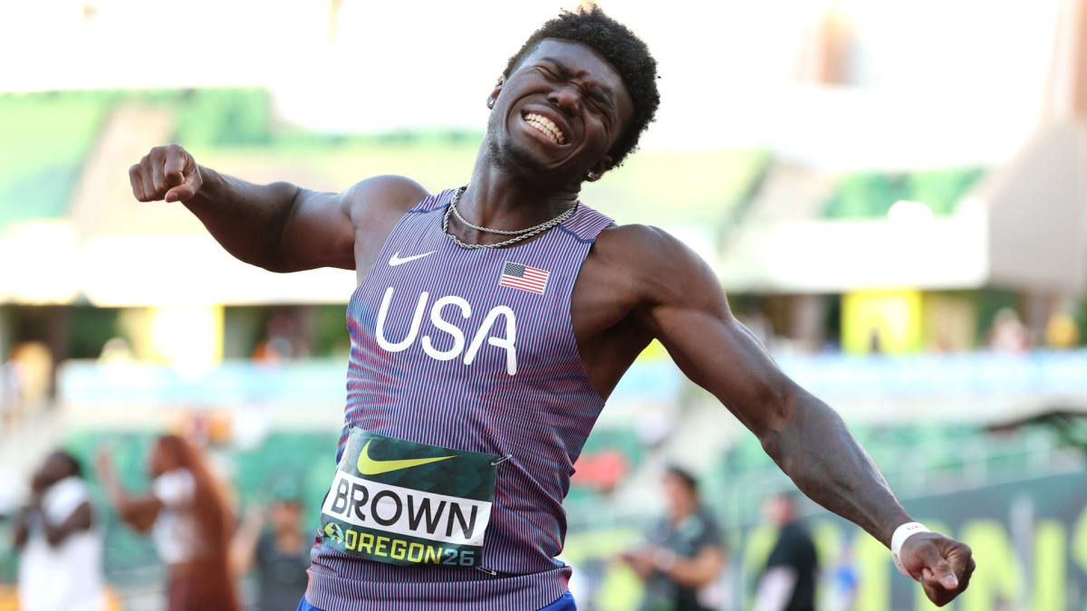 Le'Ezra Brown competing in 110-meter hurdles race setting new world record