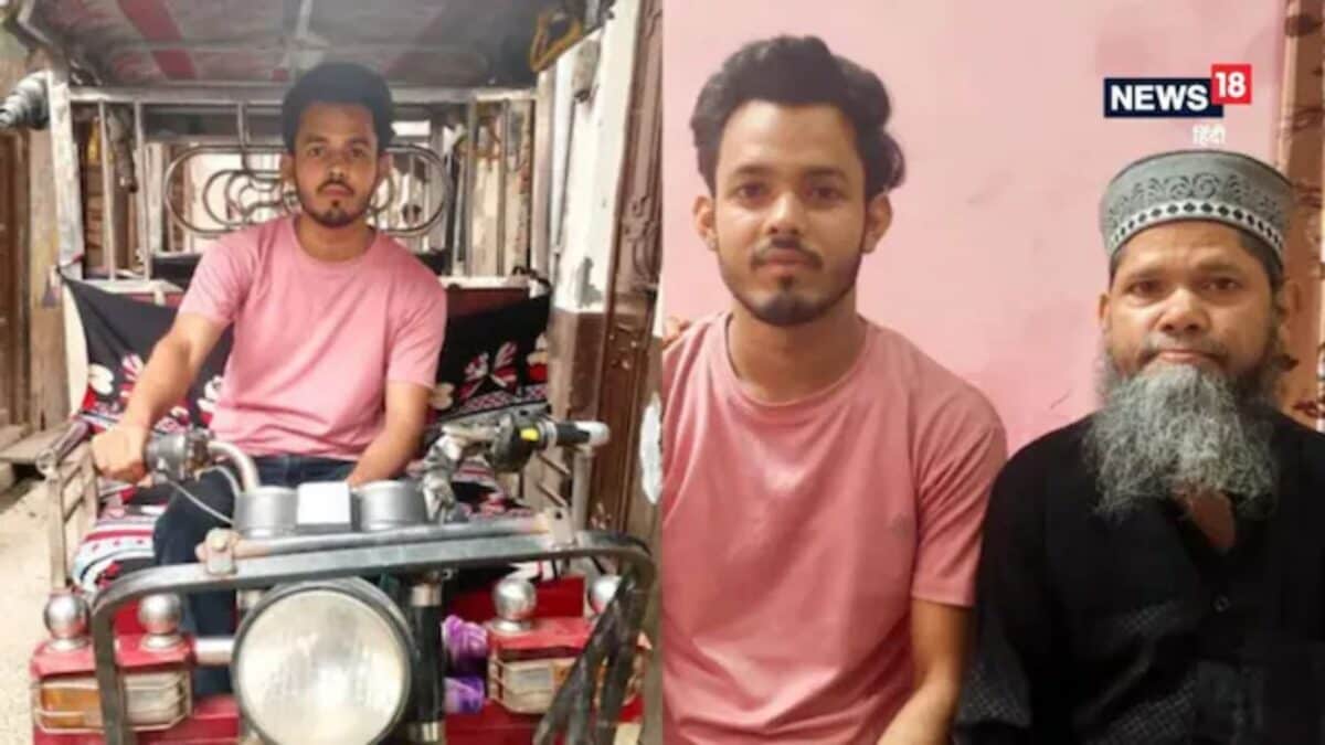 Young Indian man studying at night beside a parked rickshaw in Muzaffarnagar