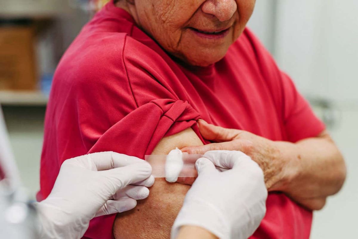 Colorful Mediterranean diet foods including fresh vegetables, fish, olive oil, and nuts arranged together