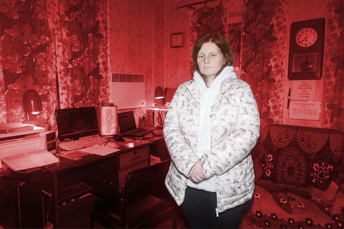 Lyudmila Dyblenko standing at her weather monitoring station in Chernobyl, Ukraine