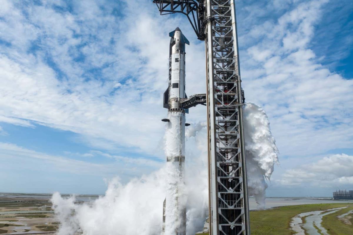 SpaceX's towering Starship 3 rocket standing on launchpad at Starbase facility in Texas