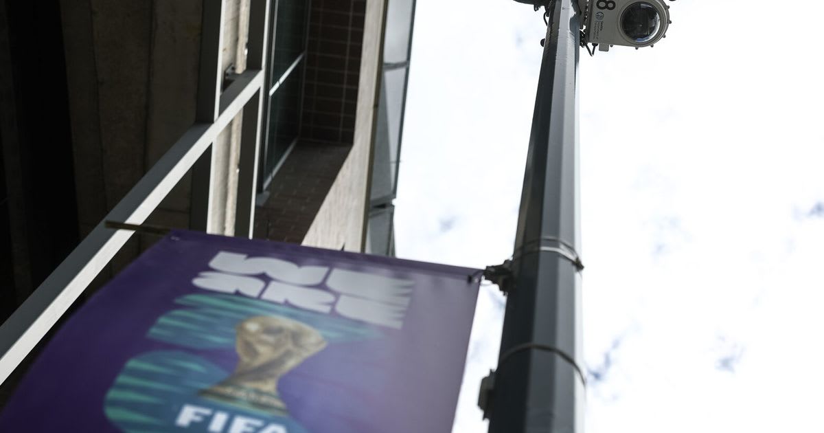 Closed-circuit television security camera mounted on light pole outside Lumen Field stadium in Seattle