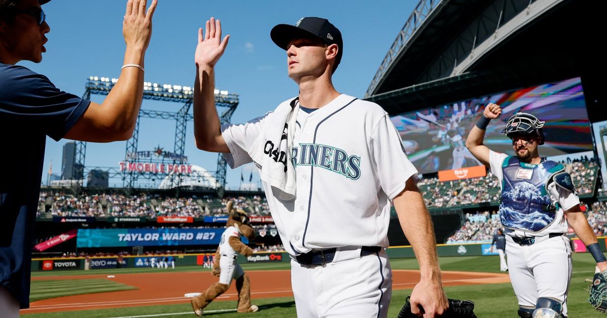Baseball player Kade Anderson standing on T-Mobile Park field during his MLB debut with Seattle Mariners