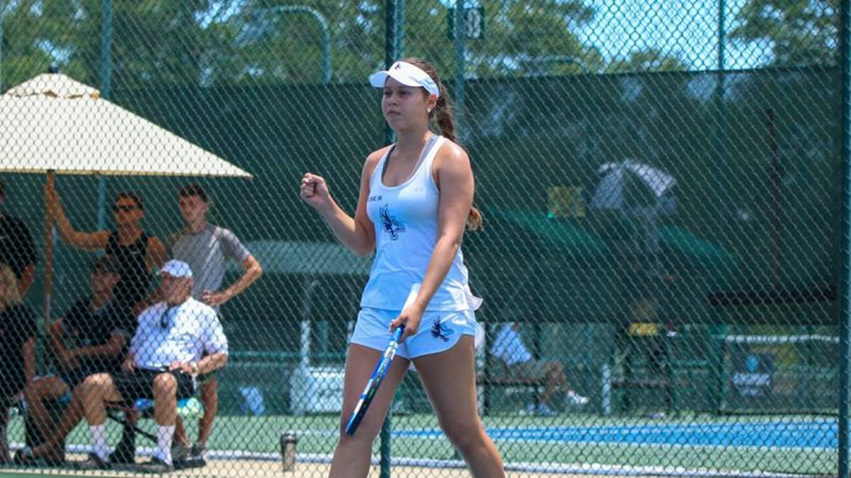 Keiser University women's tennis team competing at Mobile Tennis Center in Alabama championship semifinal match