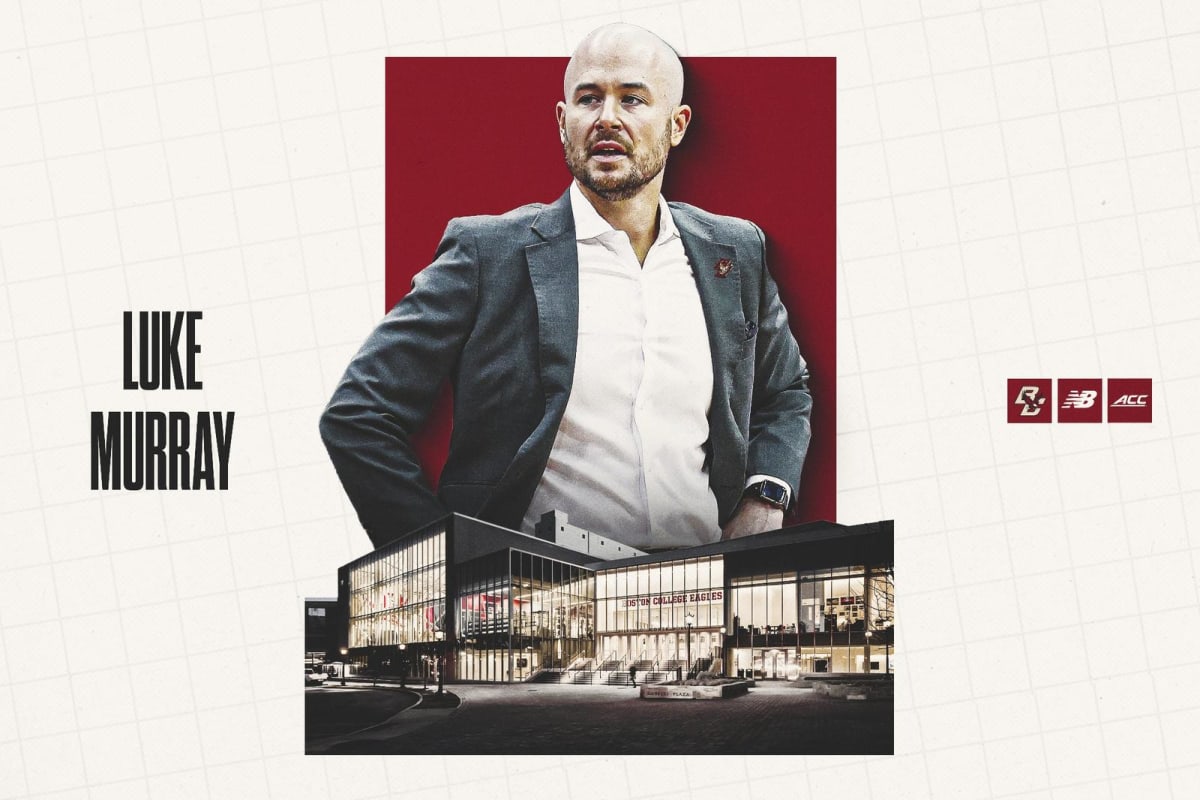 Luke Murray coaching during a UConn basketball game from the sideline