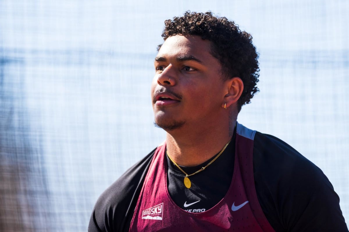 University of Montana freshman Titus Jeffrey competing in discus throw at outdoor track meet