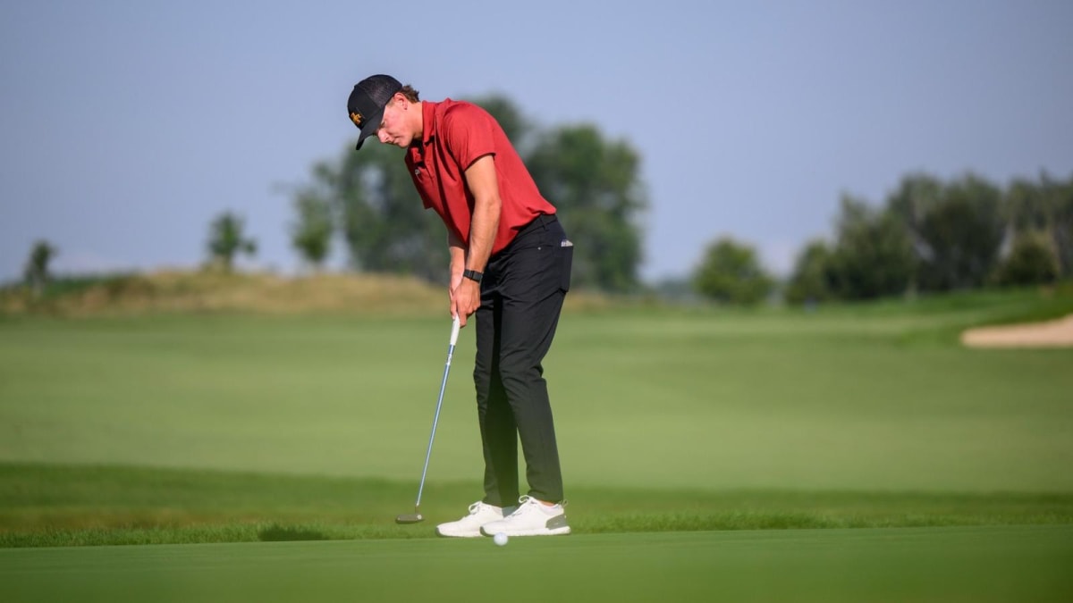 Owen Sawyer celebrating on golf course after winning Iowa Amateur Championship