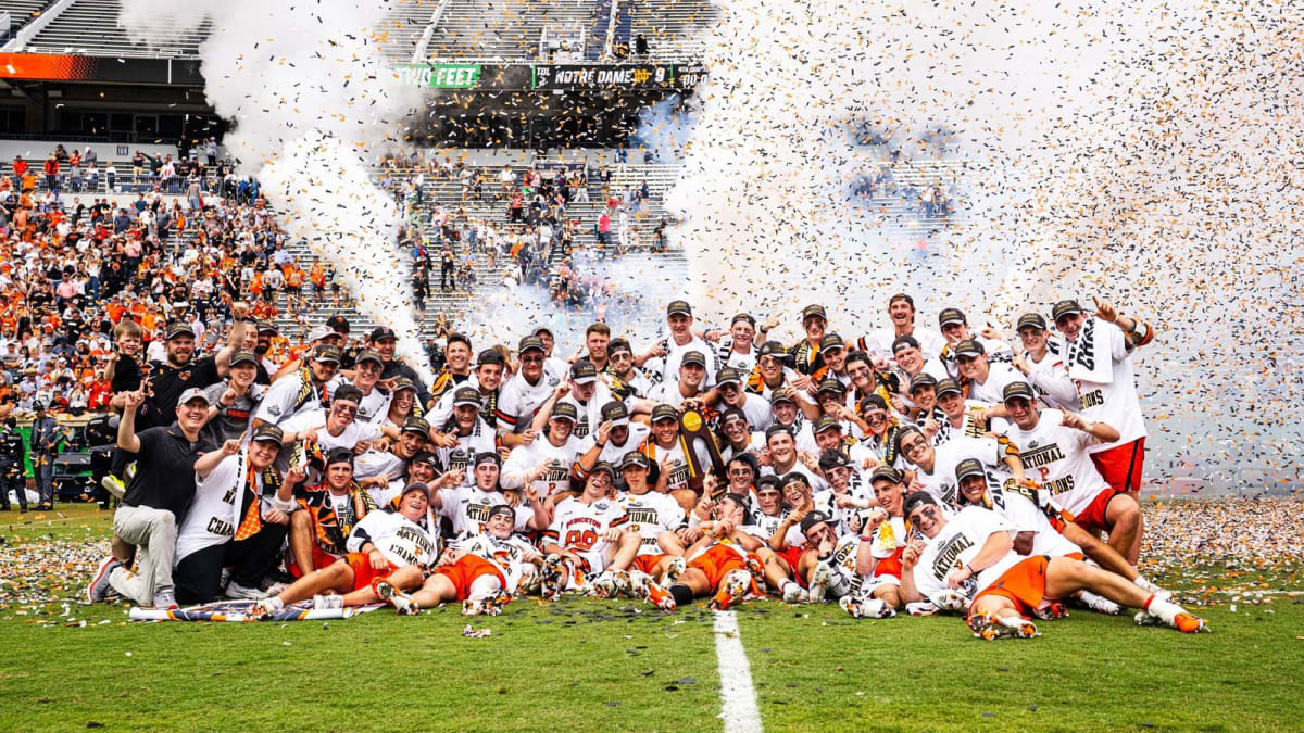 Princeton men's lacrosse team celebrating their seventh NCAA championship victory on field