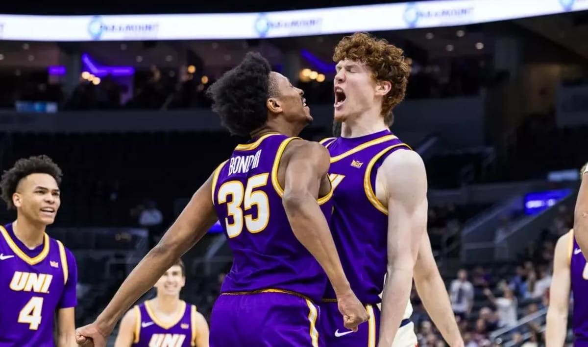 ** UNI Panthers basketball team celebrating their historic Arch Madness tournament championship victory in St. Louis