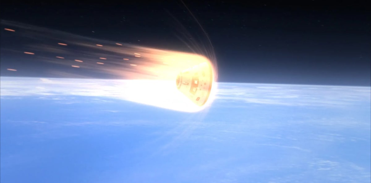 NASA's Orion spacecraft with glowing red heat shield during atmospheric re-entry from Moon mission