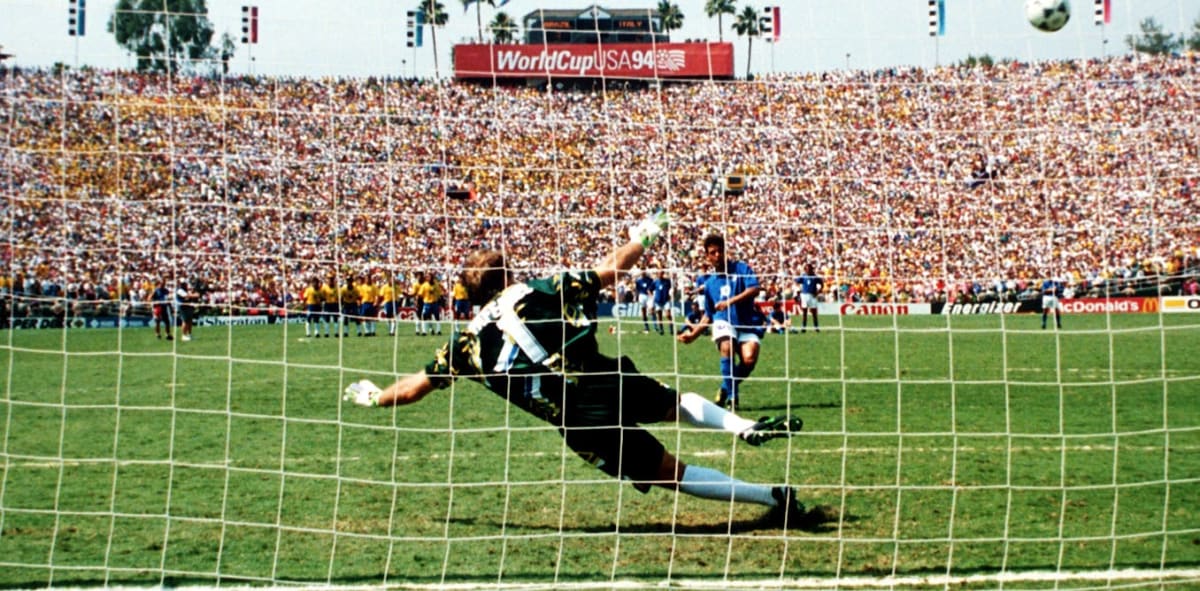 Soccer players competing during 1994 World Cup match in United States stadium