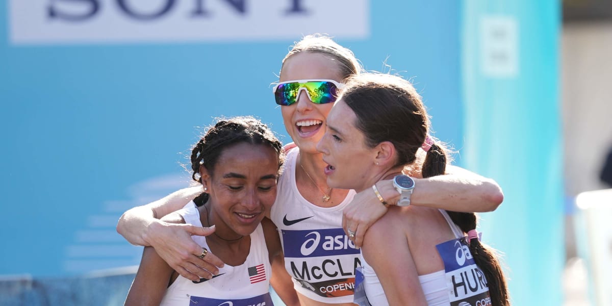 American distance runners celebrating with medals at World Road Running Championships in Copenhagen