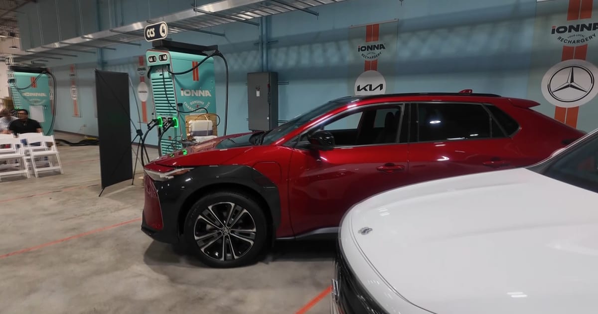 Modern electric vehicle charging station with covered bays and welcoming amenities for drivers