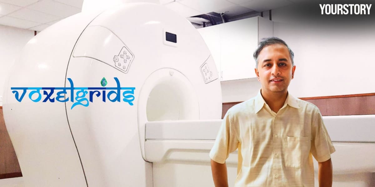 Compact MRI scanner in clinical setting at Indian hospital showing domestic medical technology innovation