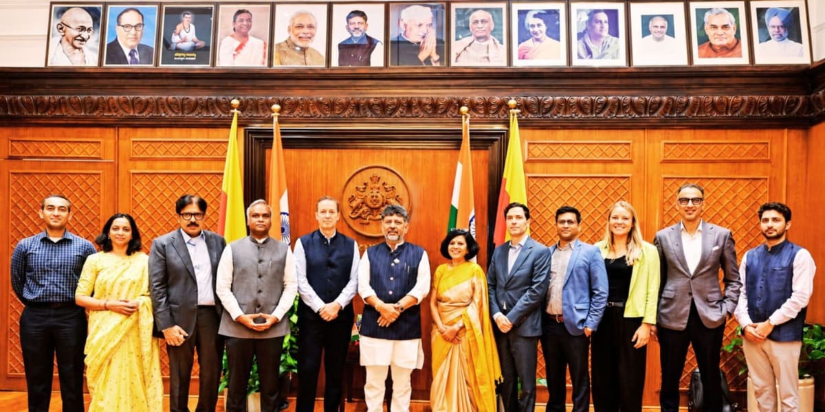Karnataka Chief Minister meeting with Anthropic executives in Bengaluru government office discussing AI partnership
