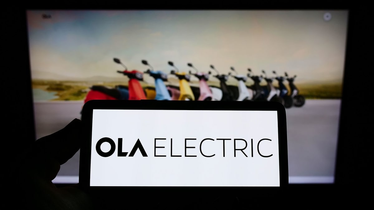 Electric scooter designed for commercial delivery riders on urban Indian street