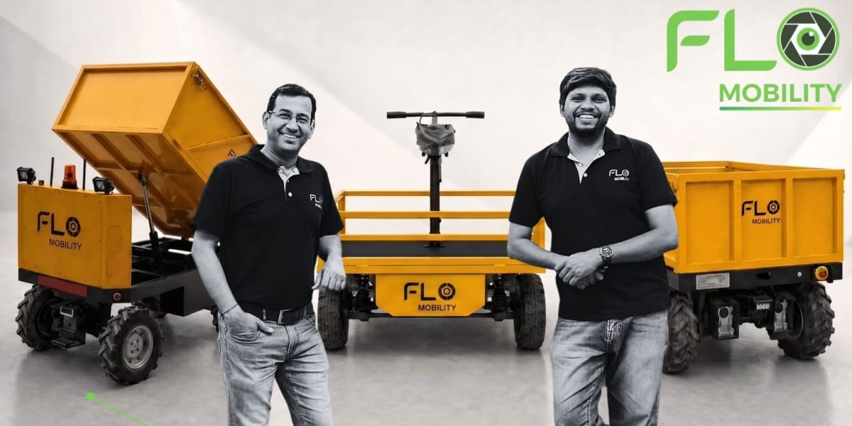 Autonomous robot carrying construction materials on an active building site in India