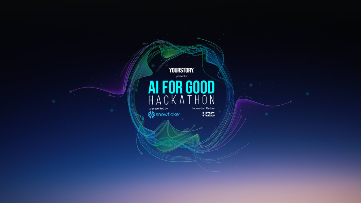 Diverse group of developers working on laptops coding AI applications for social impact