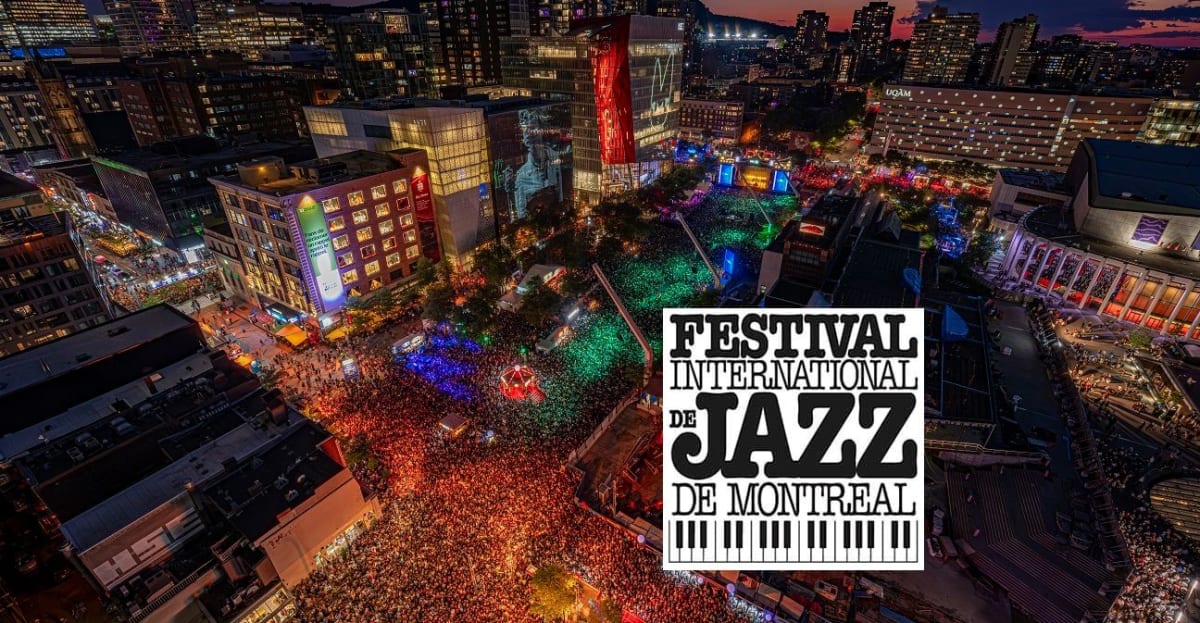 ** Musicians performing on outdoor stage at Montreal International Jazz Festival with diverse crowd watching