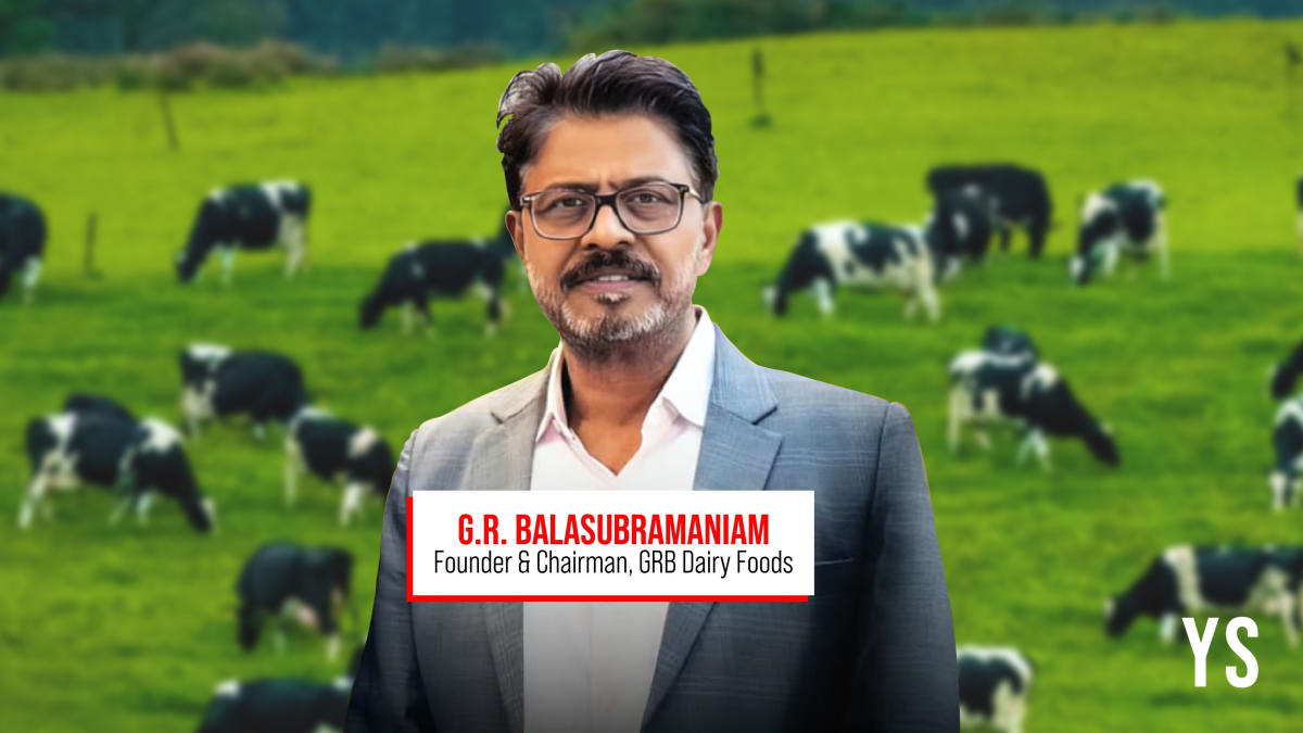 Indian entrepreneur G.R. Balasubramaniam standing in front of GRB Dairy Foods facility