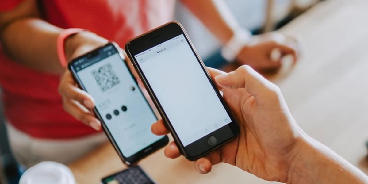 Person using smartphone to make digital payment in India using UPI system