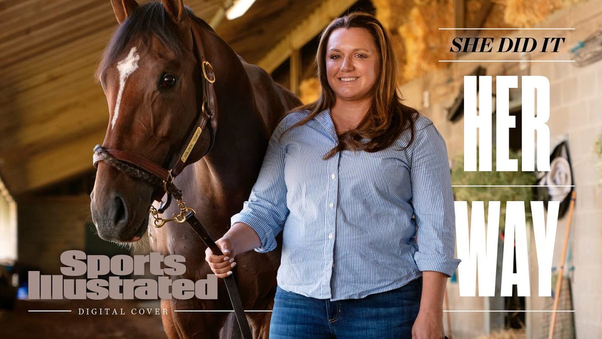Cherie DeVaux celebrates with raised arms after Golden Tempo wins Kentucky Derby