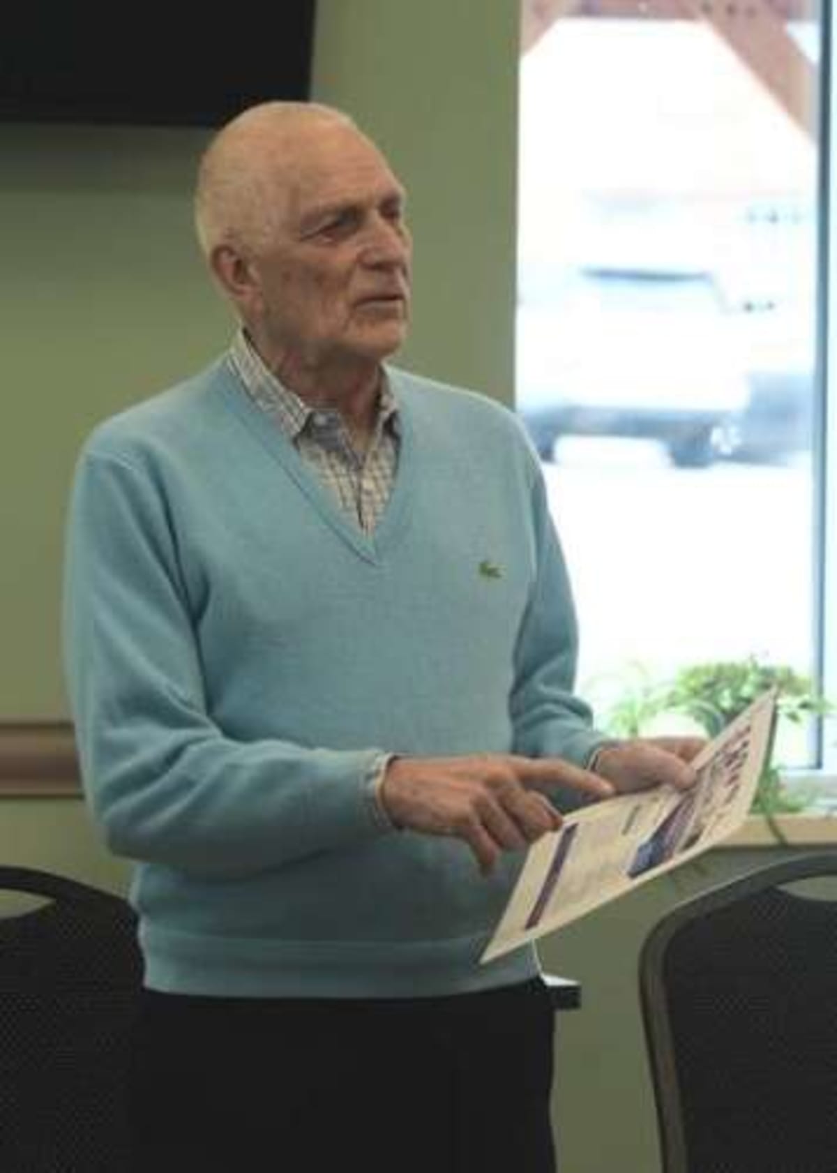 Race director Bruce Goulart speaking to seniors about upcoming Newtown community running event