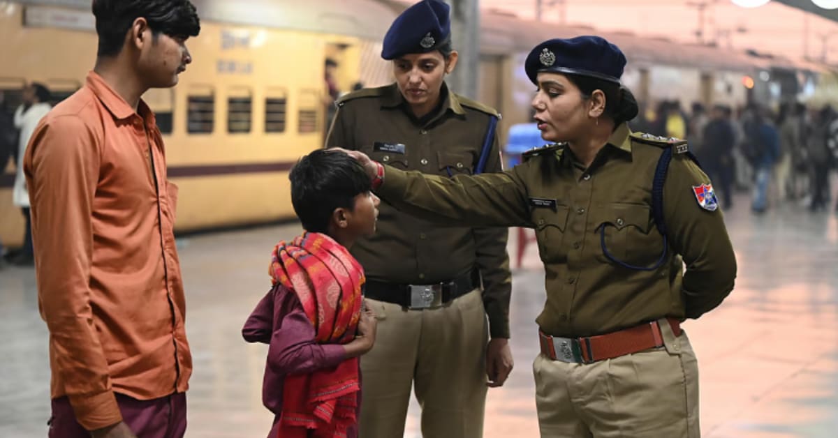 RPF Officer Chandana Sinha in uniform standing at an Indian railway platform