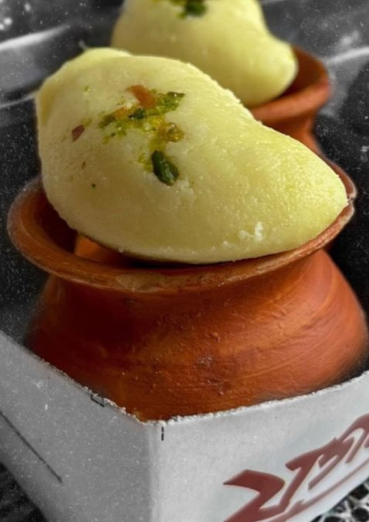 Traditional Bengali mithai sweets displayed in a family-owned shop in Kolkata, India