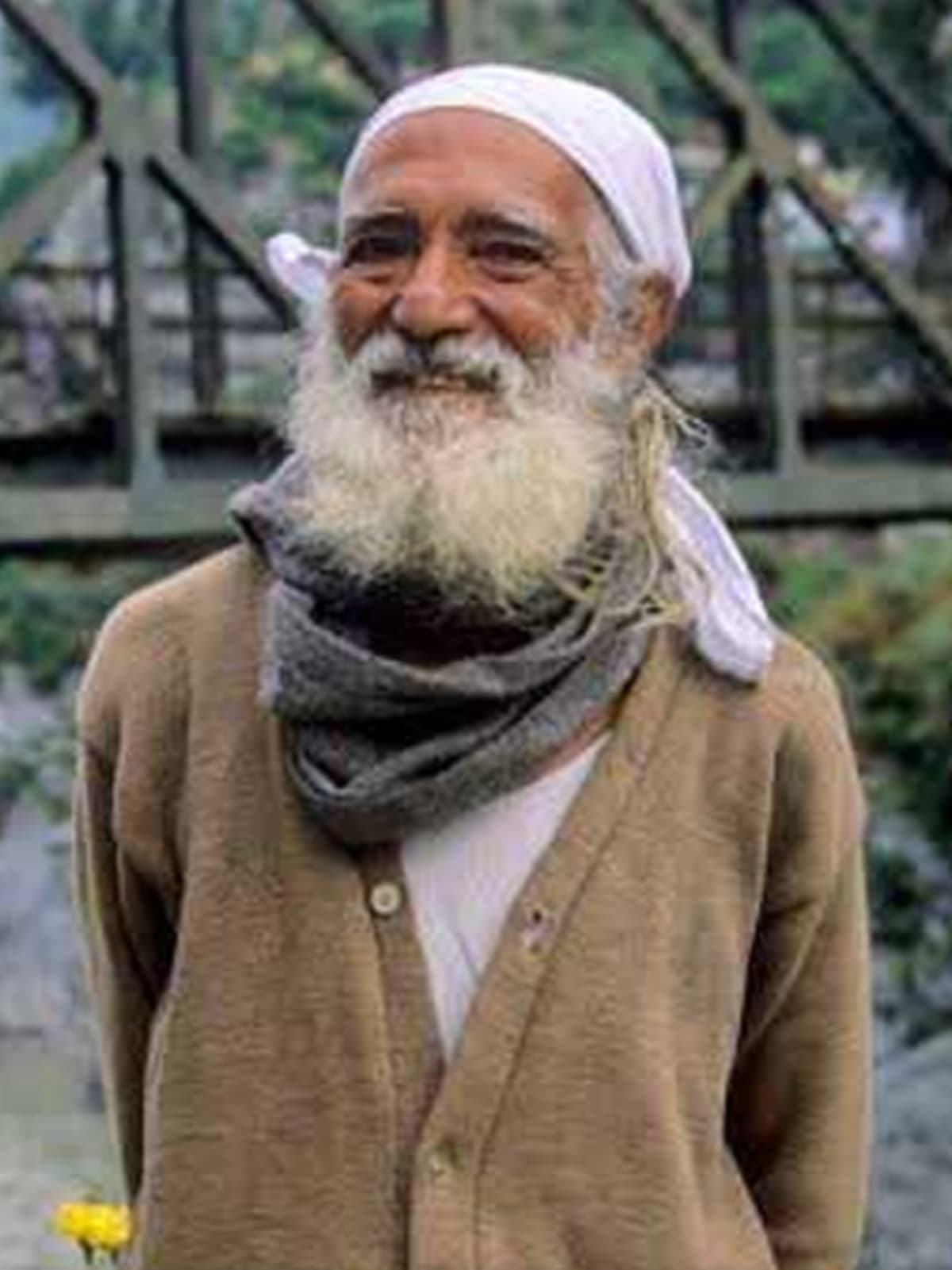 Sunderlal Bahuguna walking through Himalayan forests during his conservation campaign across India