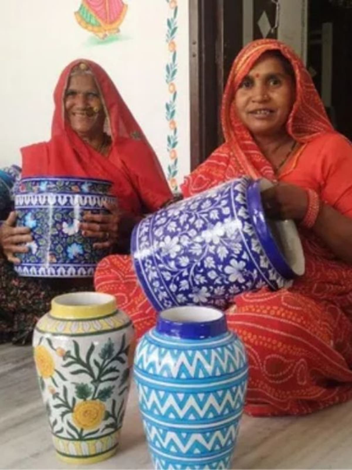 Colorful traditional Rajasthan blue pottery and hand-block printed fabric displaying intricate artisan craftsmanship