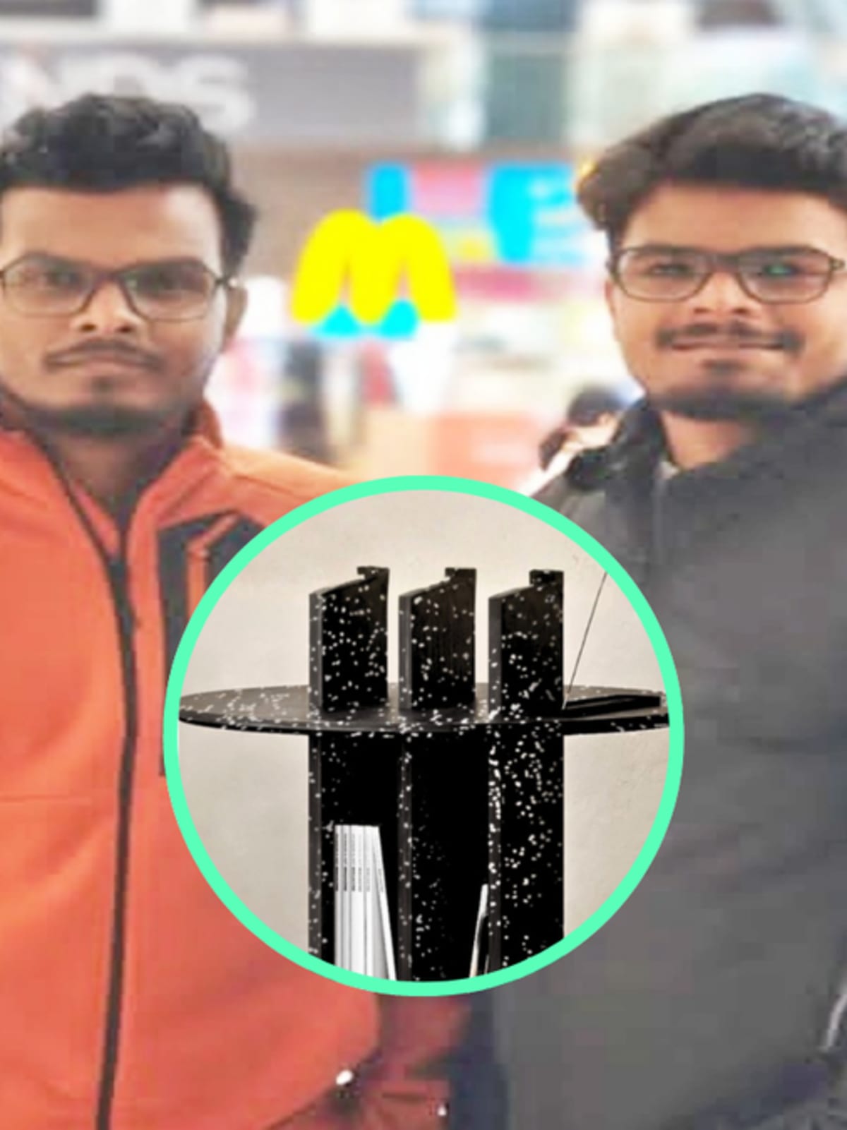 Two brothers stand beside modern furniture made from recycled plastic sheets in Bihar workshop
