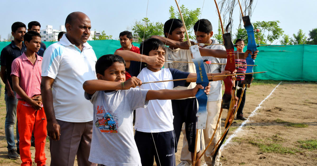 Young tribal archer from Khammam district drawing bow during training session at sports camp