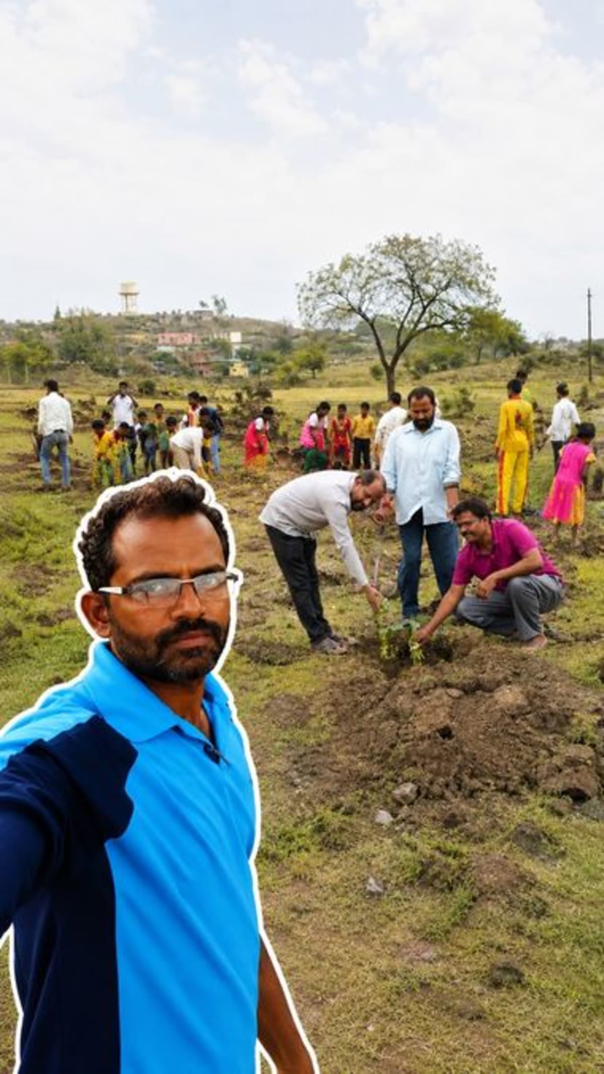 Abhay Todkar standing near water conservation structure built by village community in Maharashtra