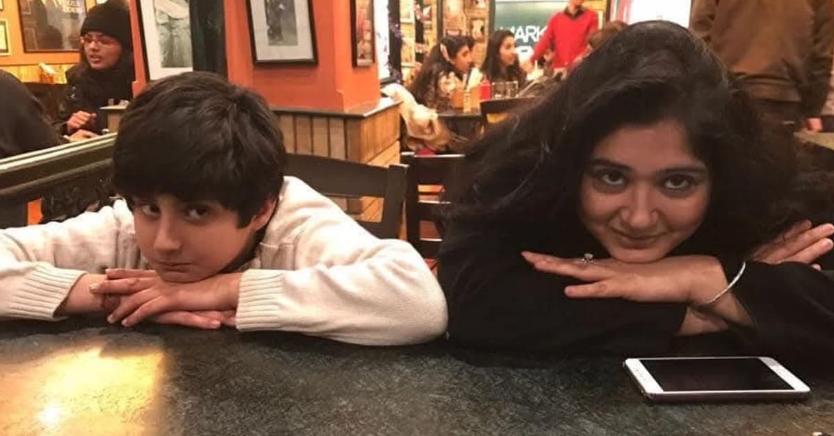 Mother and adult son smiling together, representing hope in autism journey
